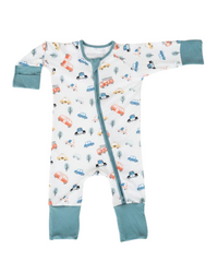 A baby long-sleeve footless sleeper with a white background covered in a colorful camping vehicle print, featuring teal cuffs and foot cuffs, and a matching teal zipper.